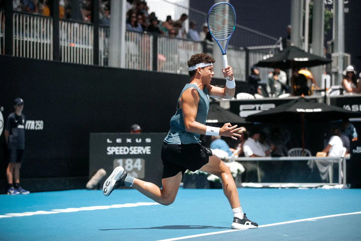 Player reaching for a shot on Centre Court at the ASB Classic