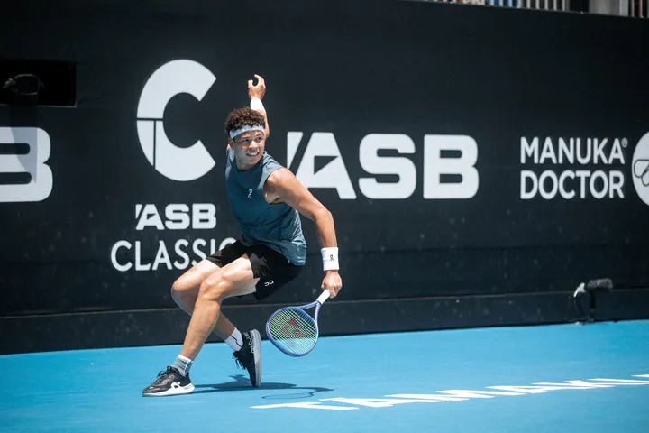 Player preparing to serve at the ASB Classic