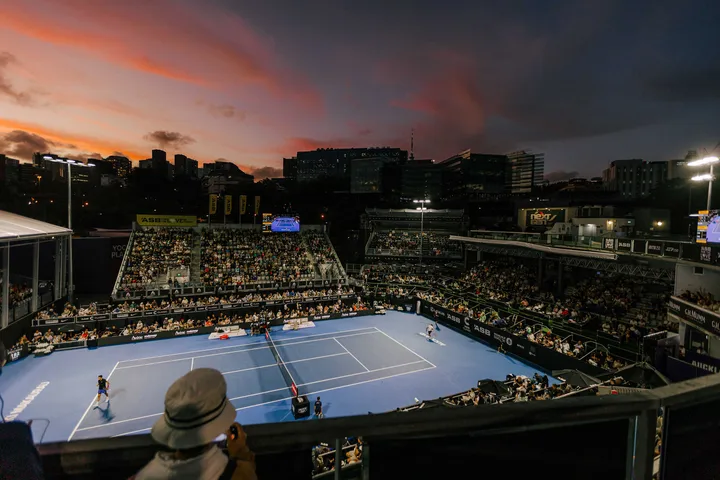 Evening tennis and courtside spectators at the ASB Classic